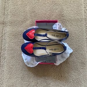 Kid’s shoes.new never use.